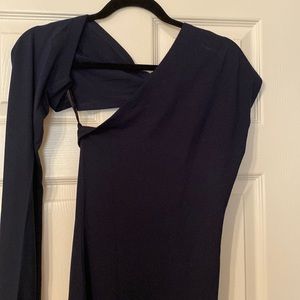 Marcella evening dress new with tags great fit, style long sleeve one shoulder.